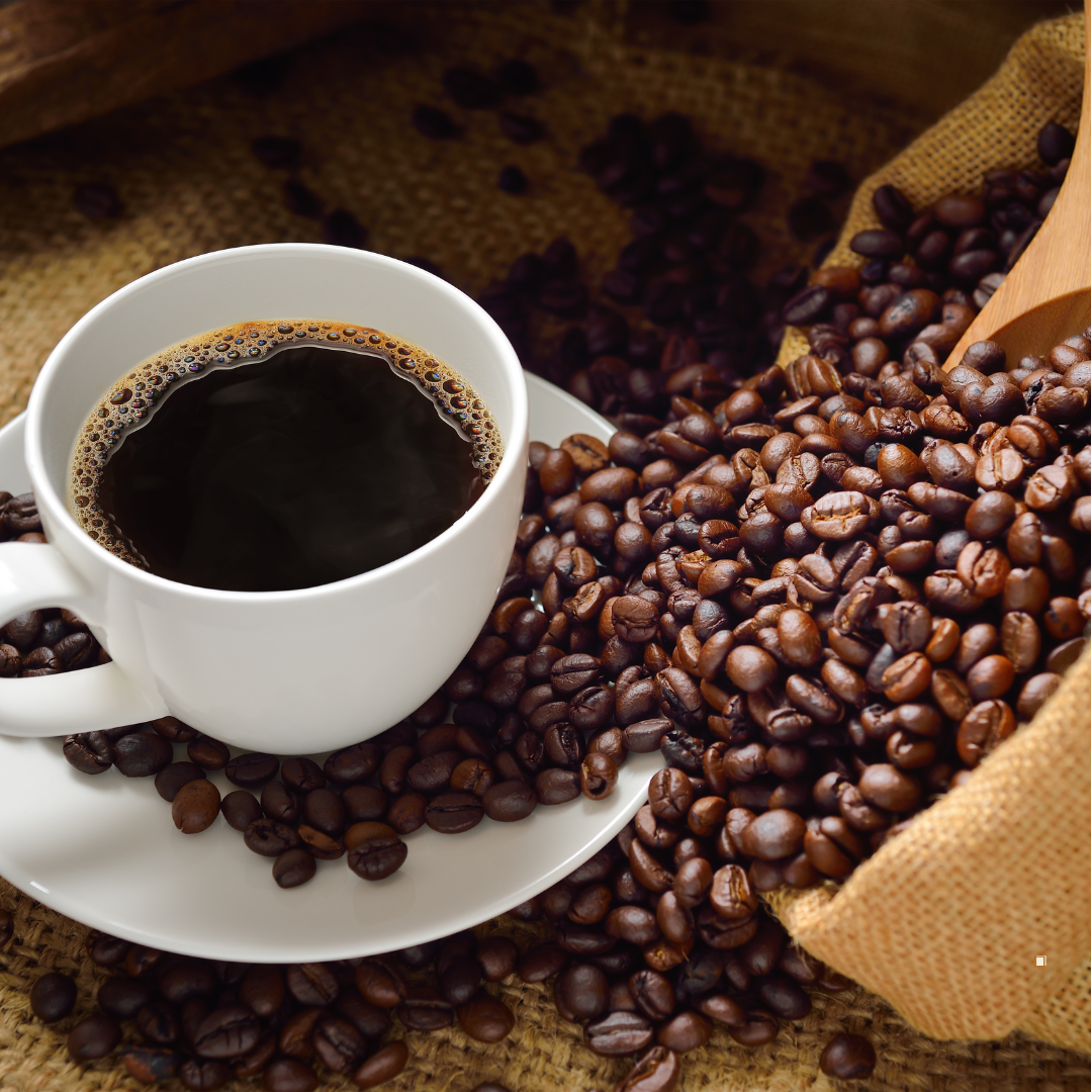 brewed blue mountain jamaican coffee in a mug with whole beans