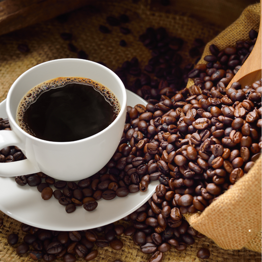 brewed blue mountain jamaican coffee in a mug with whole beans