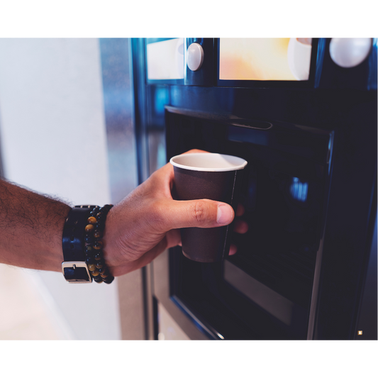 coffee pod subscription filling a cup from machine