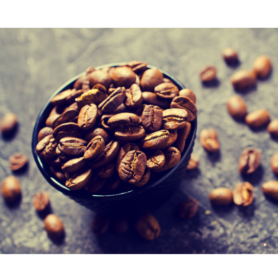 cup of whole bean decaf coffee beans
