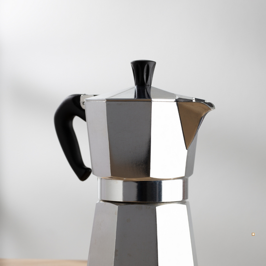 decaf ground coffee in a moka pot