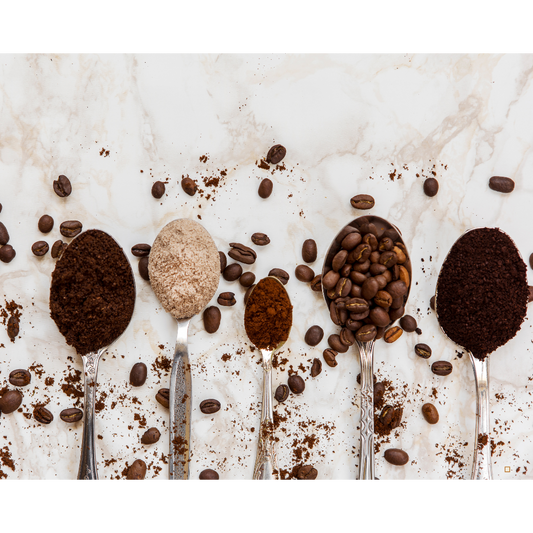 decaf ground coffee in a spoon on a table
