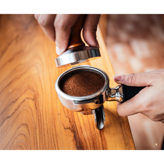decaf ground coffee in an espresso scoop