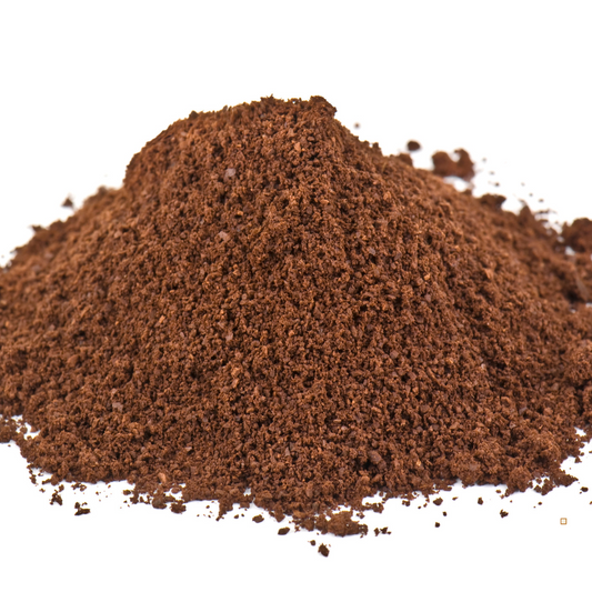decaf ground coffee on a white table top