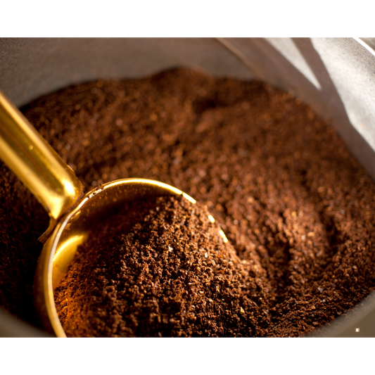 decaf ground coffee with chaff specs and wooden scoop