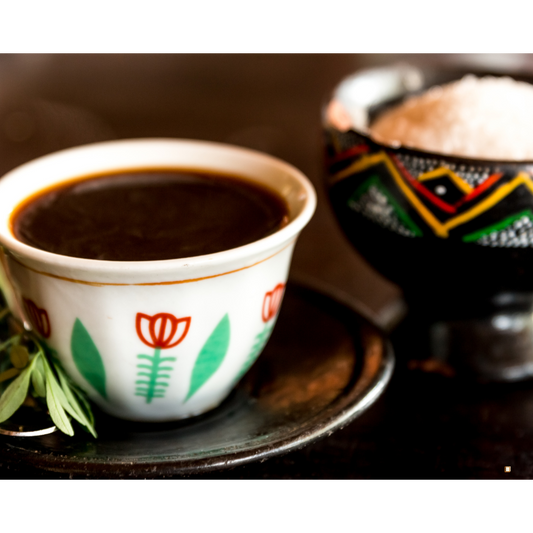 ethiopian yirgacheffee coffee in a cup with sugar bowl