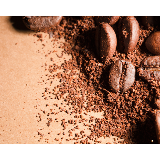 light roast coffee grounds and beans on kraft paper