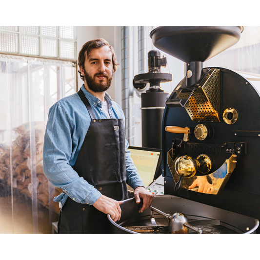 small batch coffee roaster with his machine
