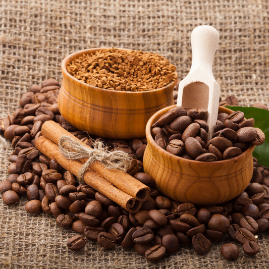 tanzanian peaberry coffee bean scoop and grinds