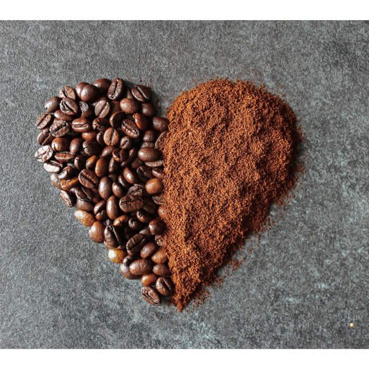 blue mountain jamaican coffee beans and grounds in heart shape