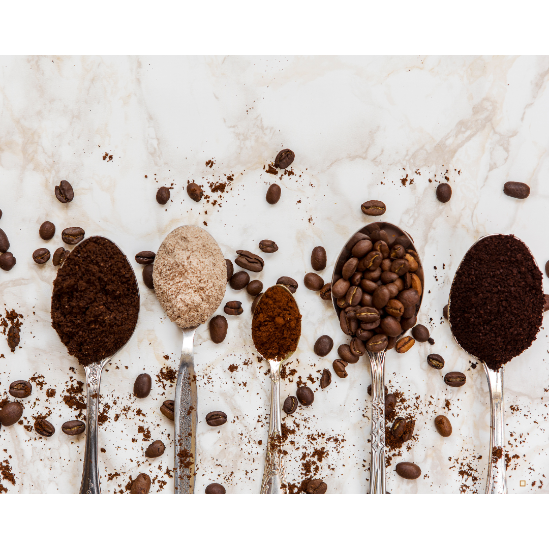 decaf ground coffee in a spoon on a table