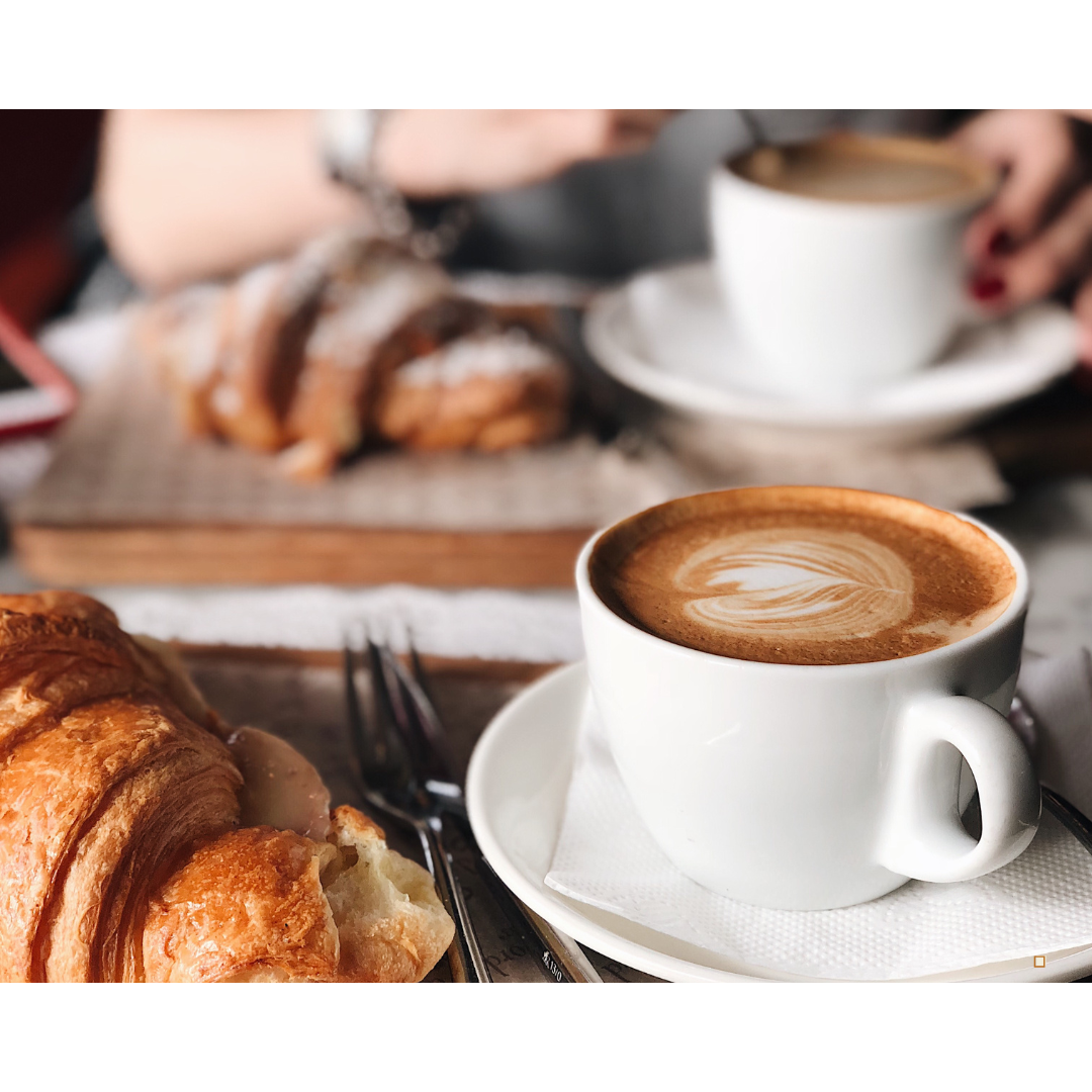 fresh brewed tanzanian peaberry coffee poured in a cup