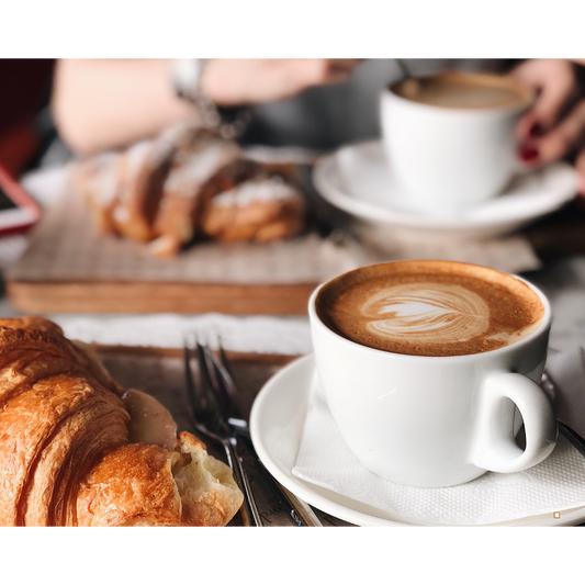 fresh brewed tanzanian peaberry coffee poured in a cup