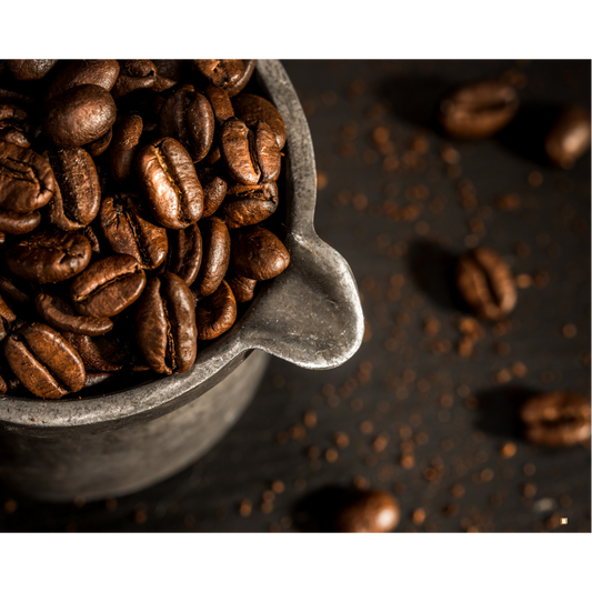 fresh roasted small batch coffee beans in a pewter cup