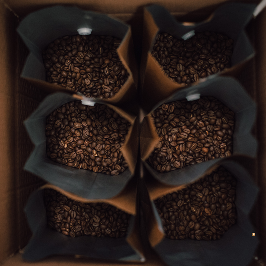 open bags of small batch coffee beans