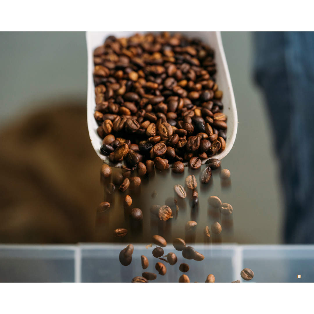 small batch roasted coffee beans with scoop