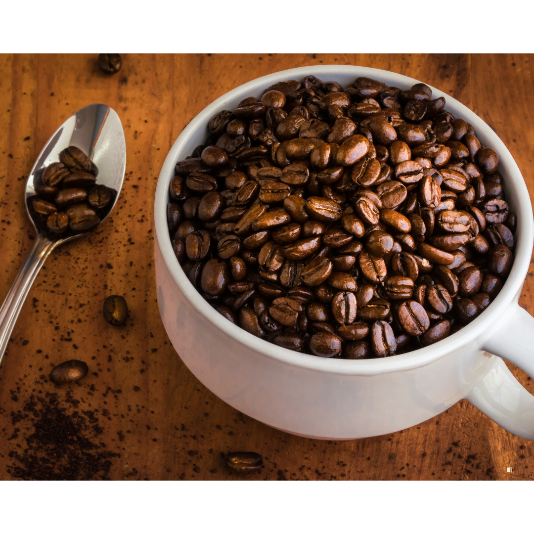 whole bean decaf coffee cup and spoon