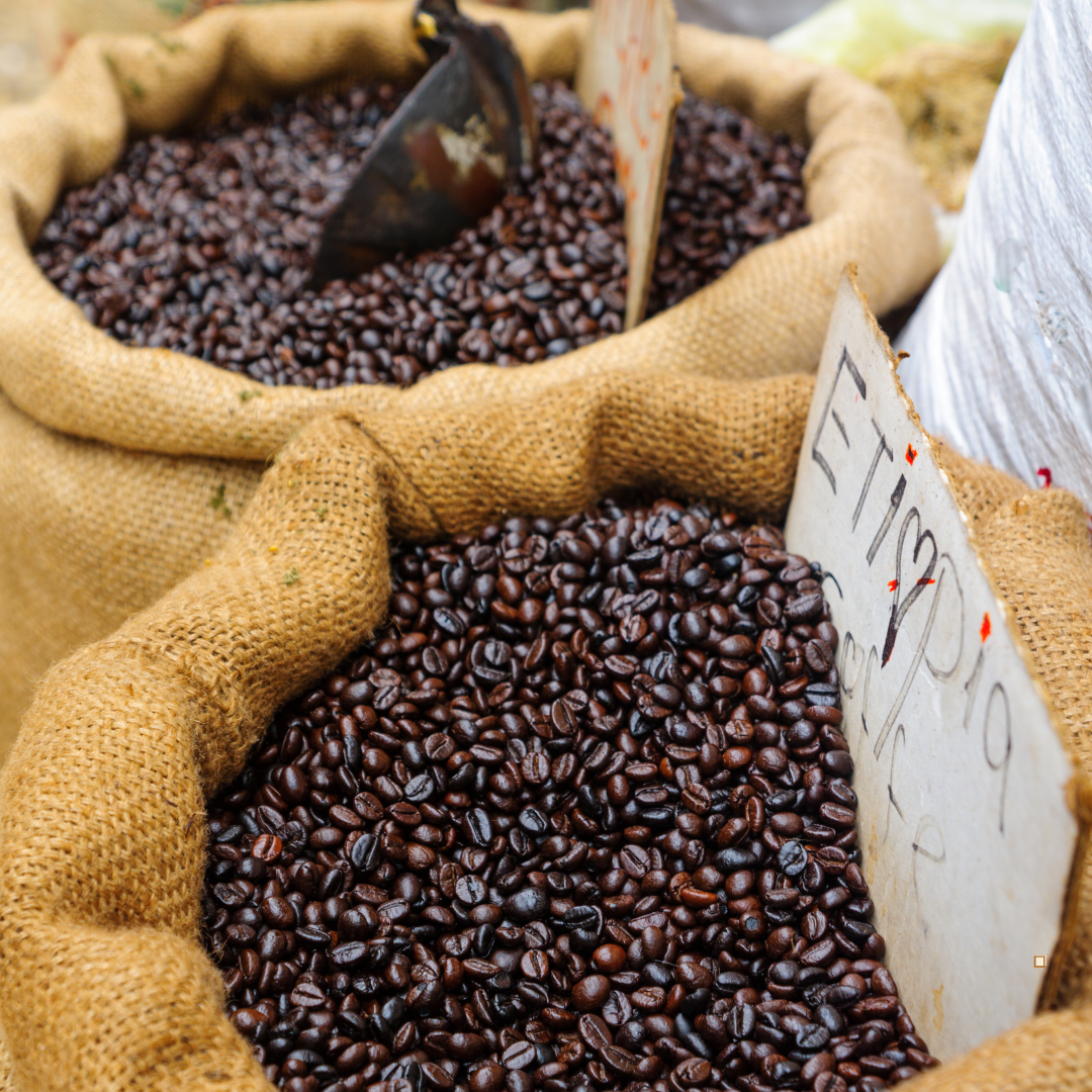 whole ethiopian yirgacheffe coffee beans in burlap bags