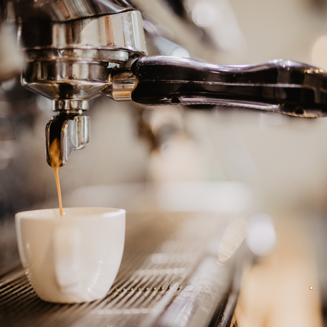 espresso beans liquified pouring into mug